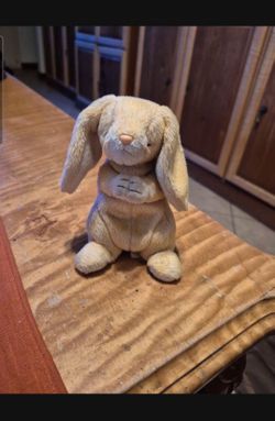 This plush is Grace, a retired and rare Ty Beanie Baby praying bunny rabbi