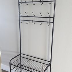 Indoor coat rack and shoe holder