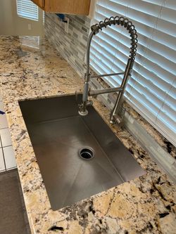 Undermount sink with faucet