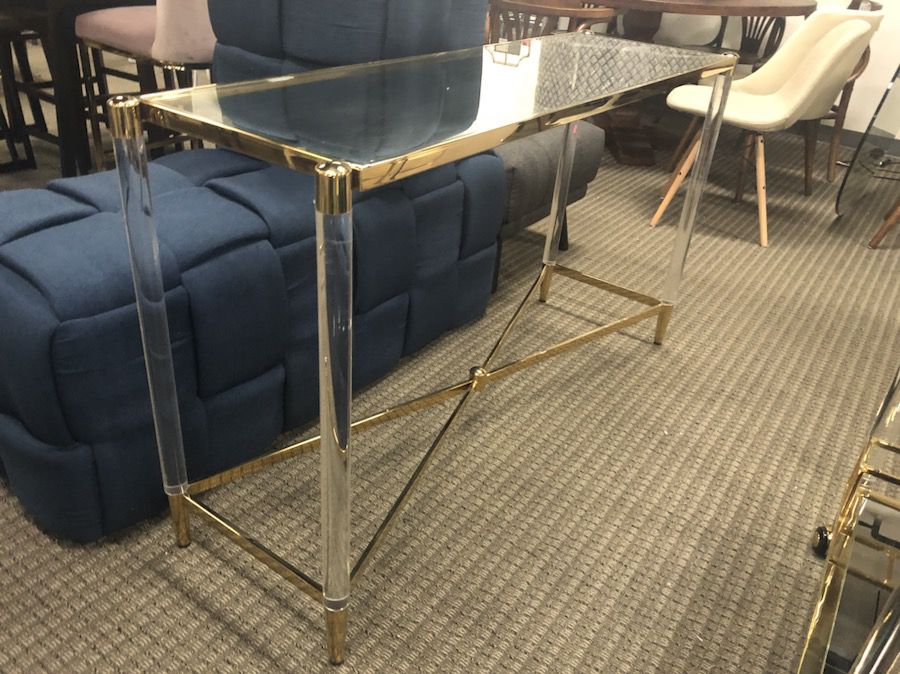 Acrylic and gold console table