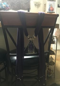 Three different colored scarfs