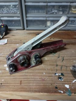 Strapping tool tentioner