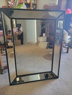 Mirror, angled edges.