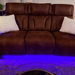 Like New- Ashley Warrior Peak Power Reclining Sofa + Protection Plan