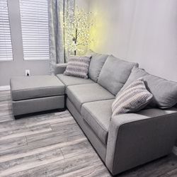 Gray Couch With Removable Footstool
