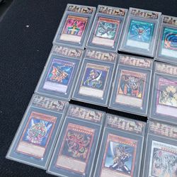 Yu-Gi-Oh Cards $80! Per Slap Great For Wall Decoration. All 14 Cards x80 is 80x 10 is $800! 80 x 4 $320! $1120 all but I can do $900! All GRADE PSA CG