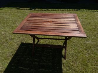 Teak patio set by Gloster