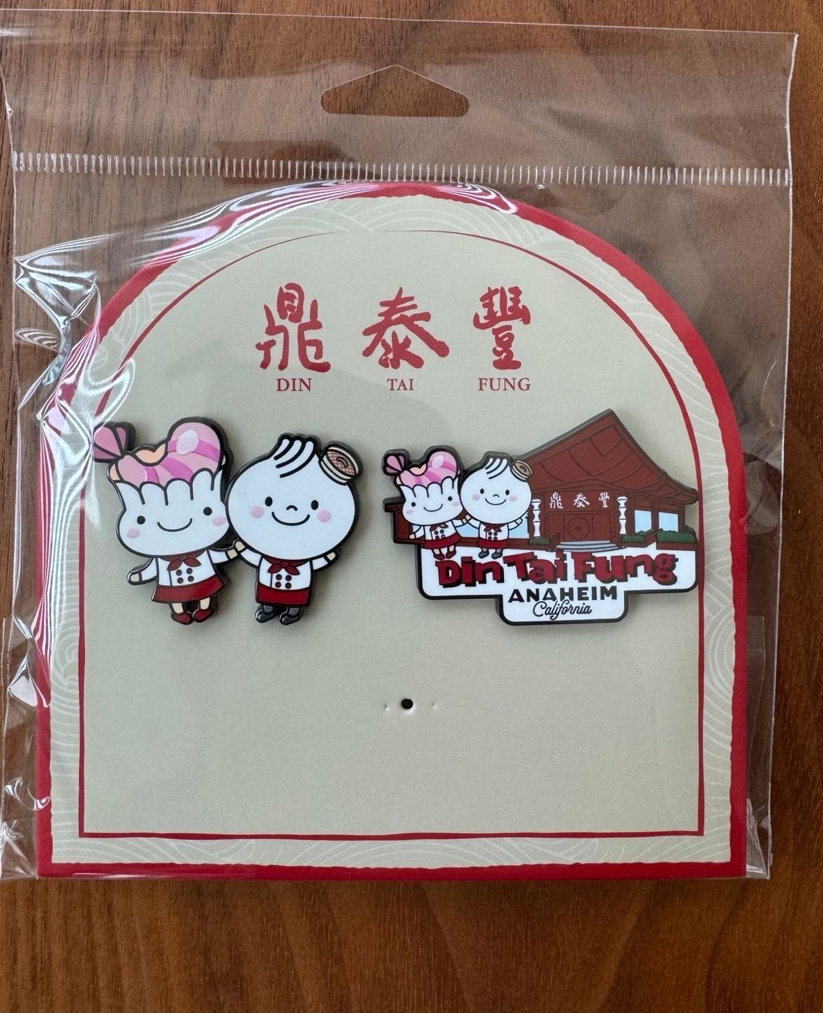 Din Tai Fung enamel pins from Disneyland exclusive