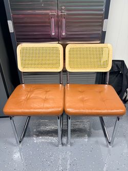Rattan faux leather dining chairs