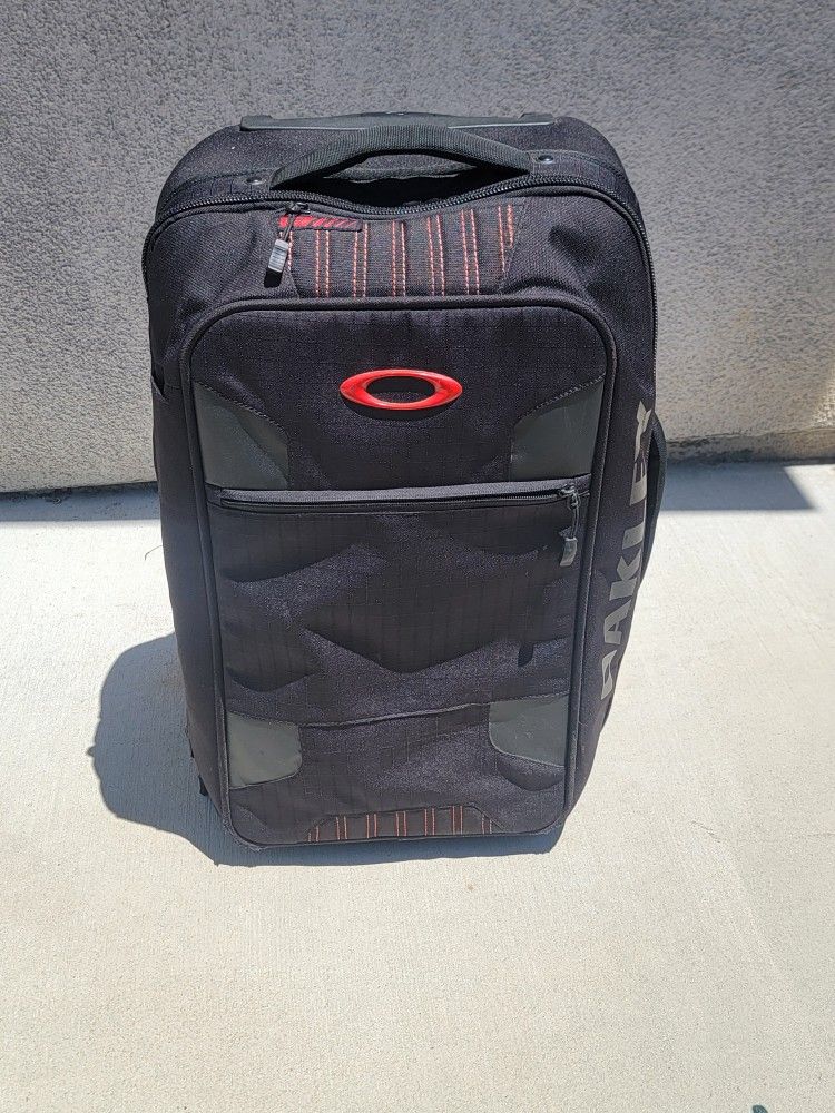 Oakley Long Weekend Carry On Roller Luggage