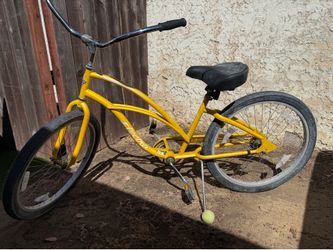 Woman’s Electra beach cruiser