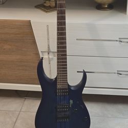 Ibanez RGAT62 electric guitar in a Sapphire Blue Flat finish.