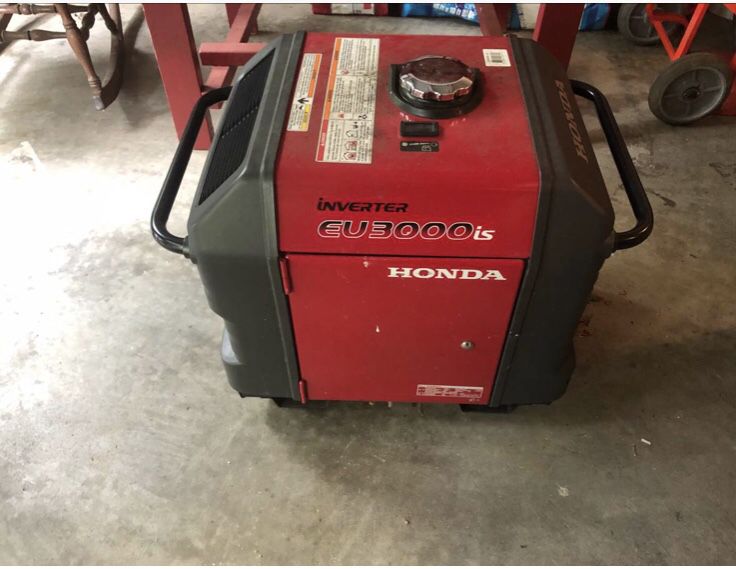 Honda eu3000is generator with hauling cage