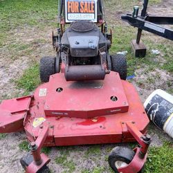 Red Standing Lawn Mower