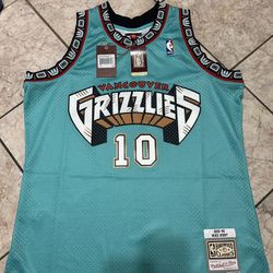 Brand new with tags Mitchell and Ness Grizzle’s Mike Bibby Jersey Size XL 