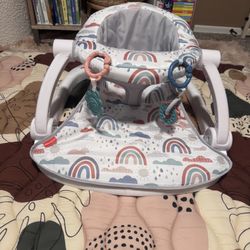Fisher-Price Portable Baby Chair Sit-Me-Up Floor Seat with Developmental Toys & Machine Washable Seat Pad, Rainbow Showers
