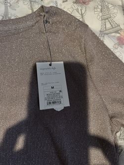 Woman, long sleeve sweater size medium