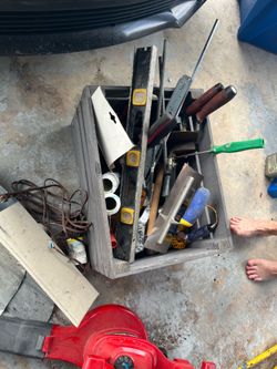 Wooden basket of tools and things