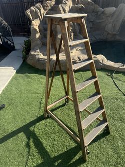 Antique library ladder On Wheels 