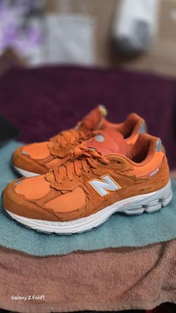 New Balance 2002R Orange Suede Sneakers