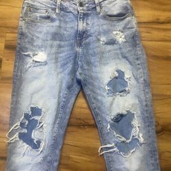 Light blue wash ripped skinny jeans 