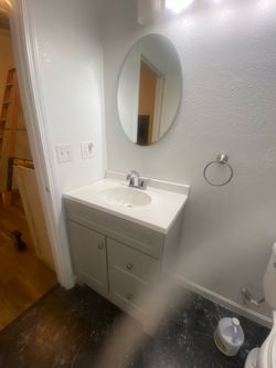 Vanity, mirror and  faucet