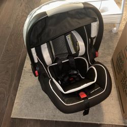 Infant car seat with base