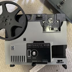 Slide and 8mm movie projectors and accessories