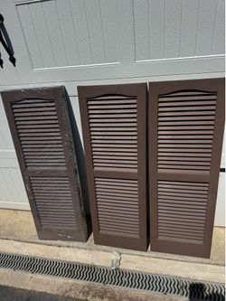 (10) Pairs Of New Vinyl Closed Louvered Brown Shutters 15”x 43”. $15 A Pair.