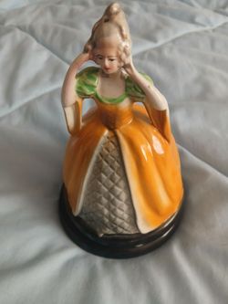 Antique pottery woman