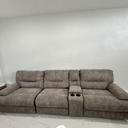 Power Reclining Sofa with multifunctional console 