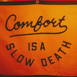 Comfort is a Slow Death Championship Banner