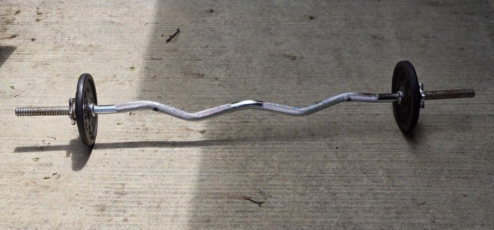Used curl bar With Weights $30.00