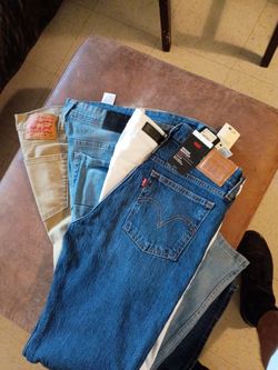 Levi's new pants 501 ,28 by32 $110 original price I want 60$  and the brown Levi's I want 20$