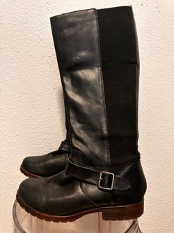 Kenneth Cole Reaction "Jenny" black leather knee-high riding boots.
