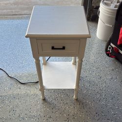 White Nite Stand With Outlets For Charging. 