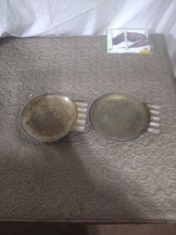 A pair vintage brass ashtrays
