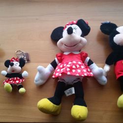 Four Mickey Mouse Dolls