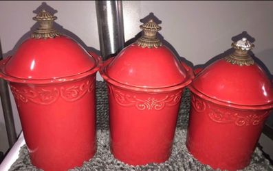 A Set Of Three Ceramic Canisters