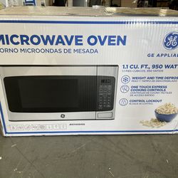 GE- 1.1 Cu.ft. Mid-Size Microwave - Stainless Steel For Sale for Sale