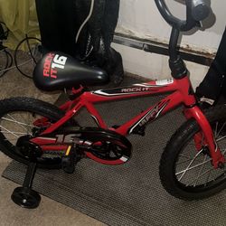 Kids brand new rock it bike with training wheels