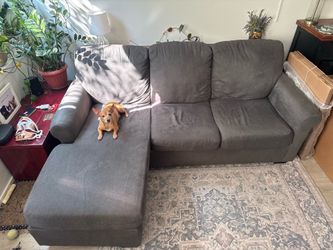 Charcoal gray sectional couch