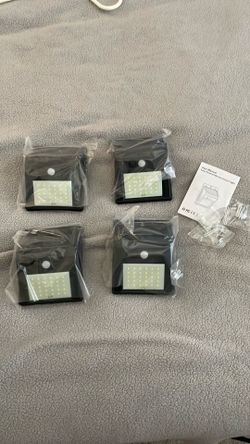 Brand New 4-Pack Solar Powered Outdoor Motion Sensor lights