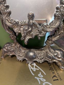 Vintage Siver Plated Dresser Tilt Mirror with repousse motifs. Art Nouveau Cherubs. 12"