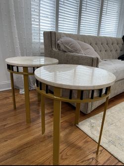 Marble top end tables with Aluminum base  $195 each 