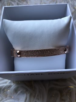 MK rose gold bangle bracelet