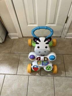 FISHER PRICE WALKER WITH LIGHTS, MUSIC AND ACTIVITIES 