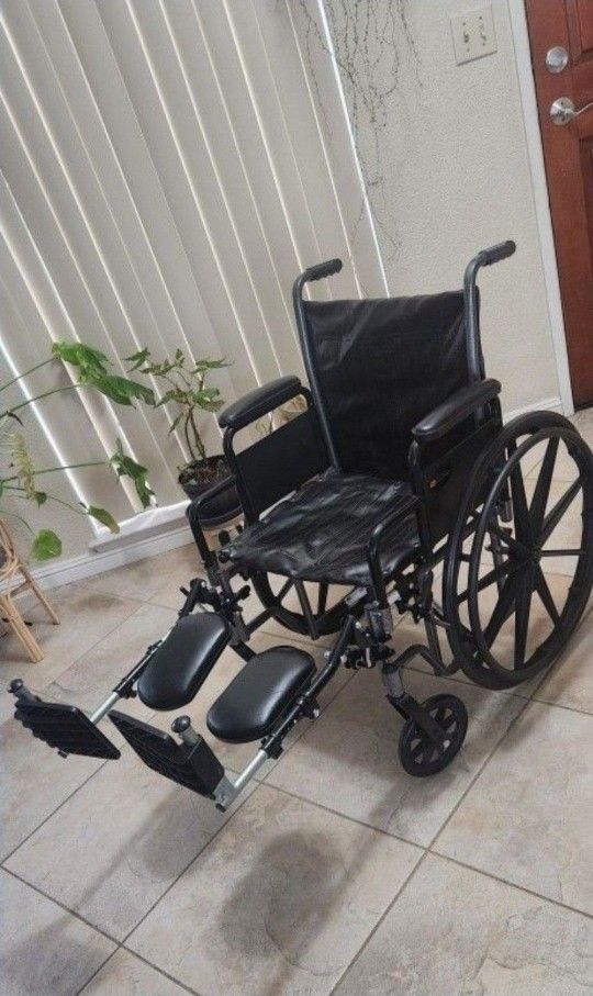 Wheelchair With Elevated Foot Rest