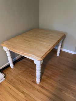 Wooden table with 5 chairs and leaf