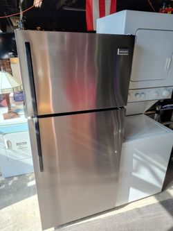 Black and stainless steel refrigerator working great condition 28-in